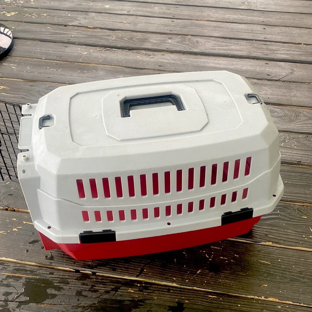 USED TRAVEL PET CARRIER INCLUDES SMALL PINK BOWL